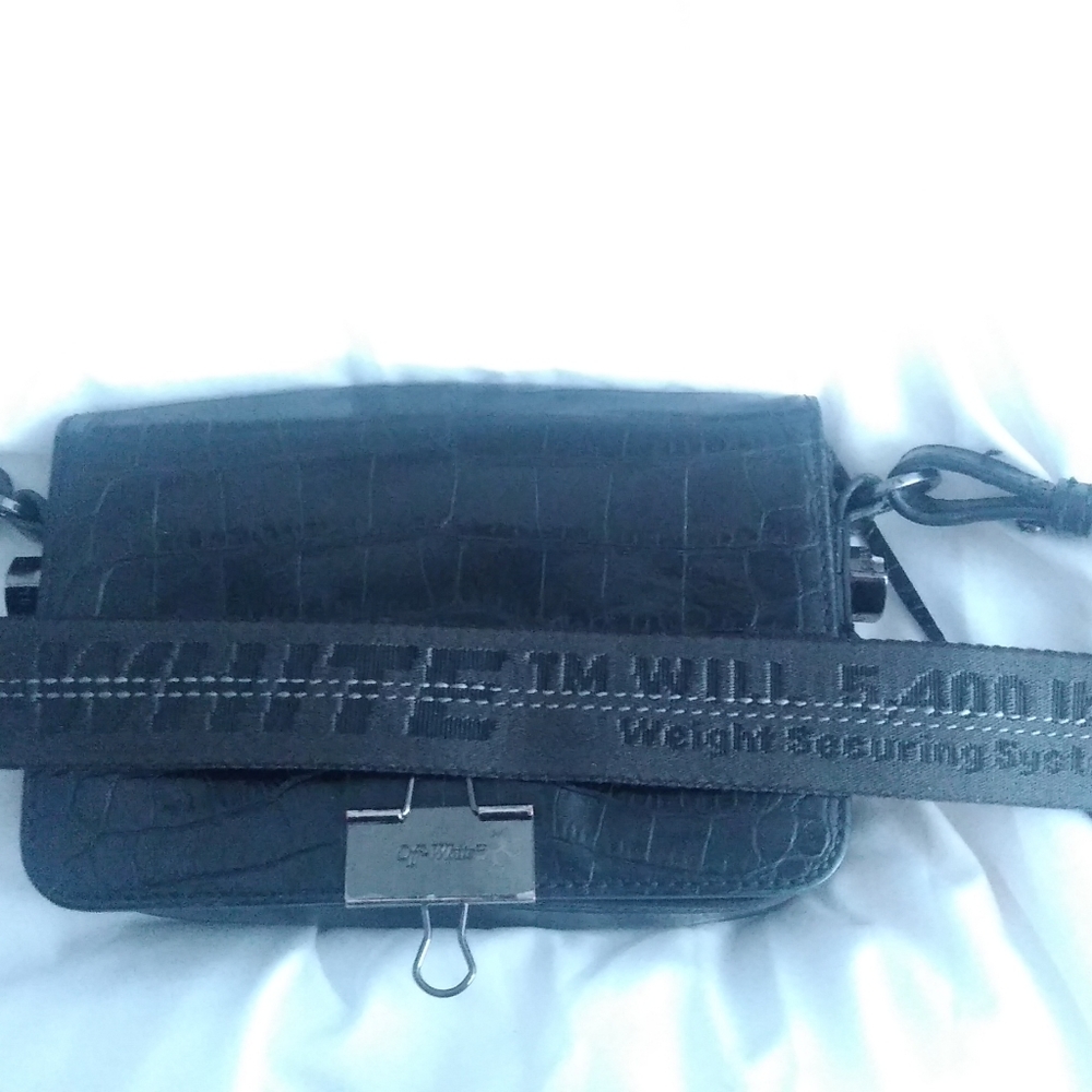Off-white clutch purse